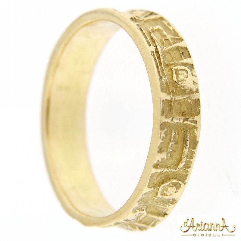 Fede lavorata unisex in oro giallo 18kt