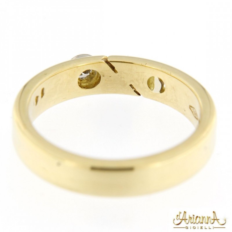 Fede in oro giallo e bianco 18kt con diamante 0,06ct colore G purezza VS2
