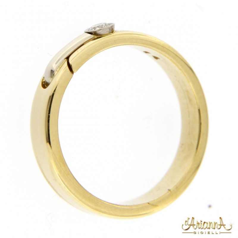 Fede in oro giallo e bianco 18kt con diamante 0,06ct colore G purezza VS2
