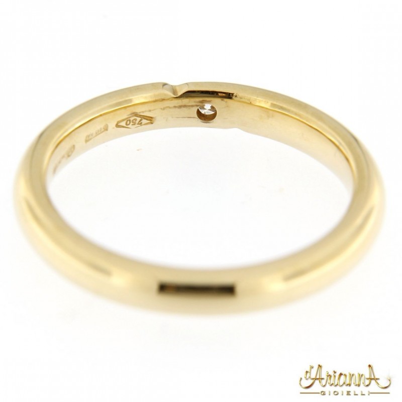 Fede in oro giallo 18kt con diamante 0,11ct. colore G purezza VS2
