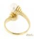 Anello contrarié con perle di acqua salata in oro giallo 750