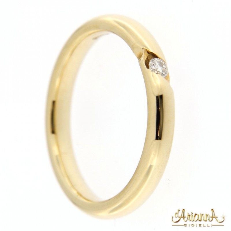 Fede in oro giallo 18kt con diamante 0,11ct. colore G purezza VS2