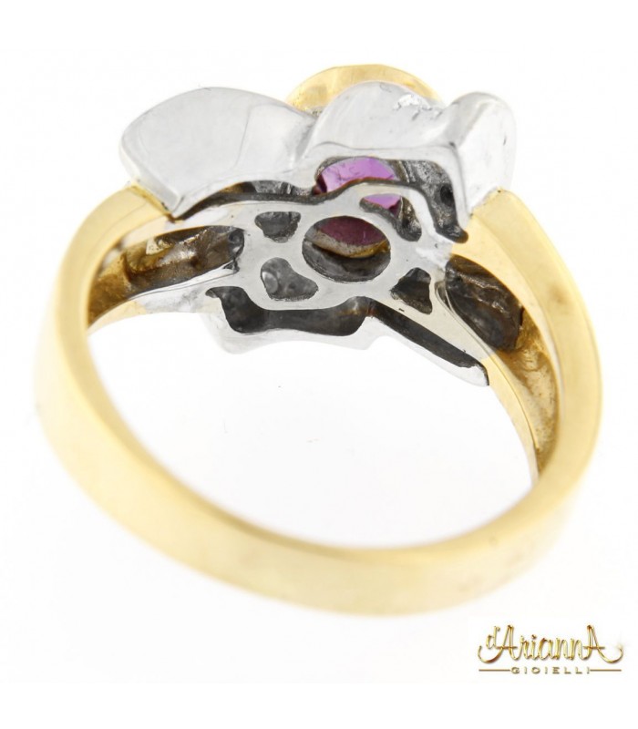 Anello in oro 18kt bicolore giallo e bianco con Rubino 0,70ct. e diamanti 0,28ct.