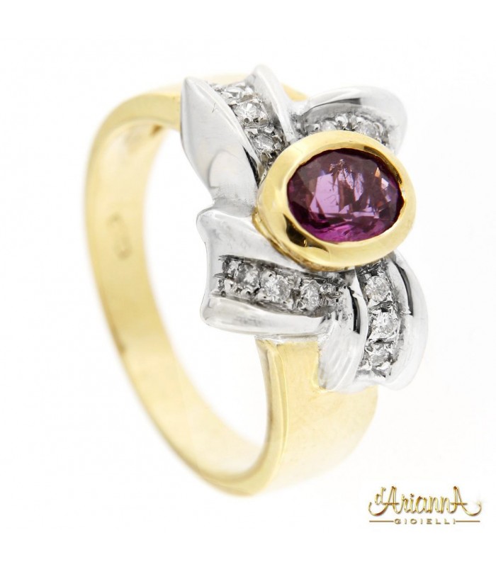 Anello in oro 18kt bicolore giallo e bianco con Rubino 0,70ct. e diamanti 0,28ct.